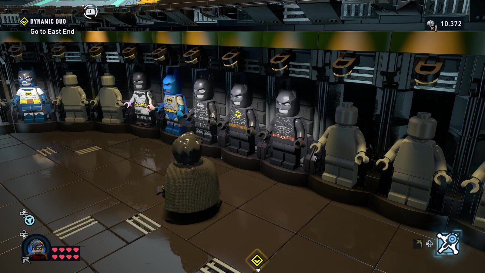 How many suits are in Lego Batman Legacy of the Dark Knight?