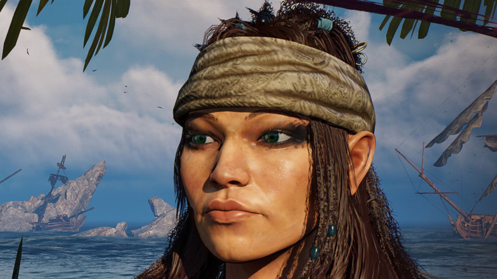 Woman wearing bandana appears up-close in front of rocky waters and shipwrecks